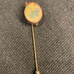 Turtle on wood pin